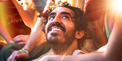Dev Patel as Kid smiling in Monkey Man