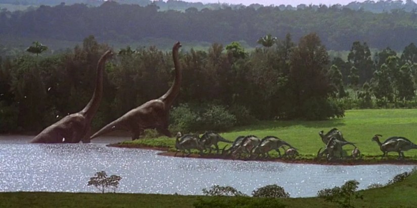 A group of Parasaurolophus drinking from a lake in Jurassic Park