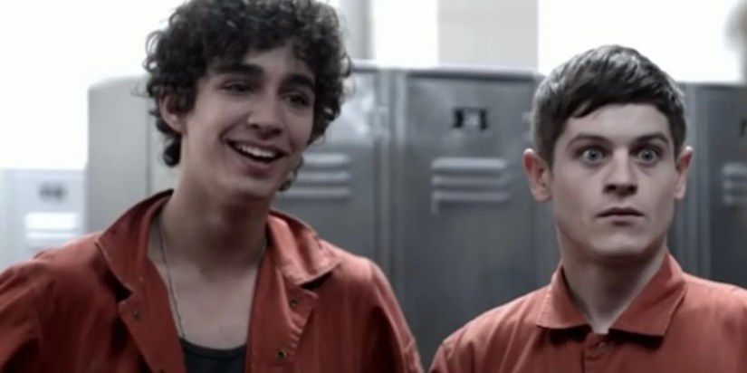 Robert Sheehan as Nathan Young laughing as Iwan Rheon as Simon Bellamy looks stunned in the community centre’s changing rooms in Misfits.