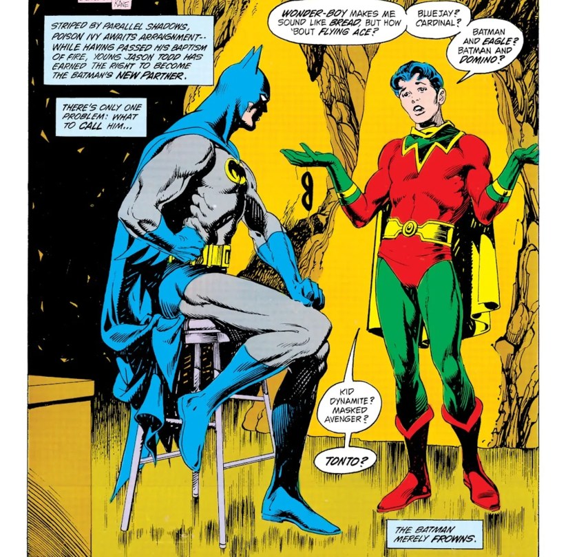 Batman and Jason Todd go over possible vigilante codenames while Jason Todd is in his original sidekick suit.