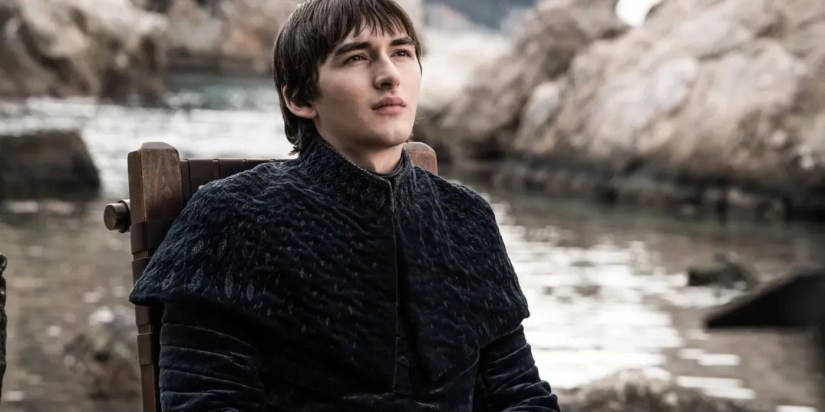 Isaac Hempstead Wright as Bran Stark in his wheelchair by the water in the Game of Thrones finale