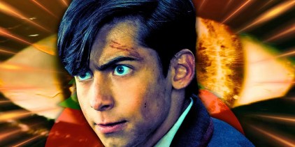 Number Five from The Umbrella Academy as an intense expression on his face. A golden eye is in the background.