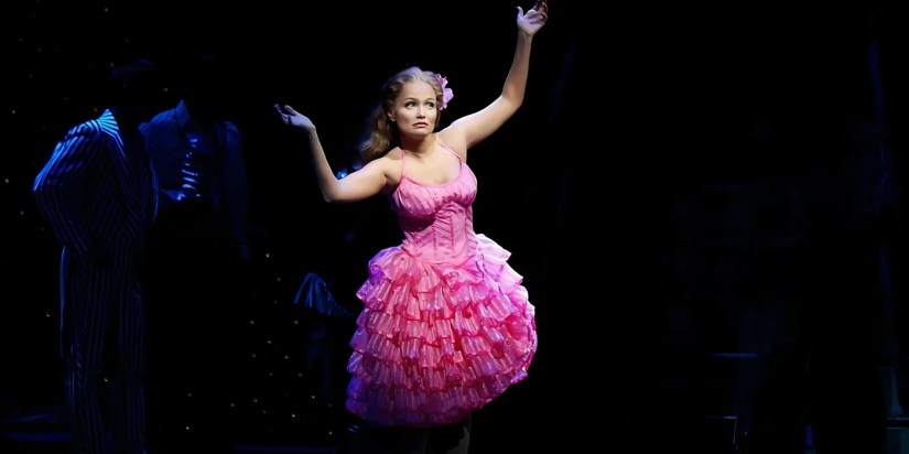 Kristin Chenoweth as Glinda dancing in Wicked on Broadway