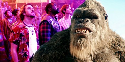 Three human characters looking up while Godzilla grunts in Godzilla x Kong