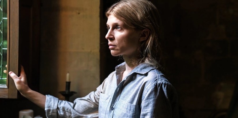 Clémence Poésy as Isabelle looking out a window in Daryl Dixon season 2.