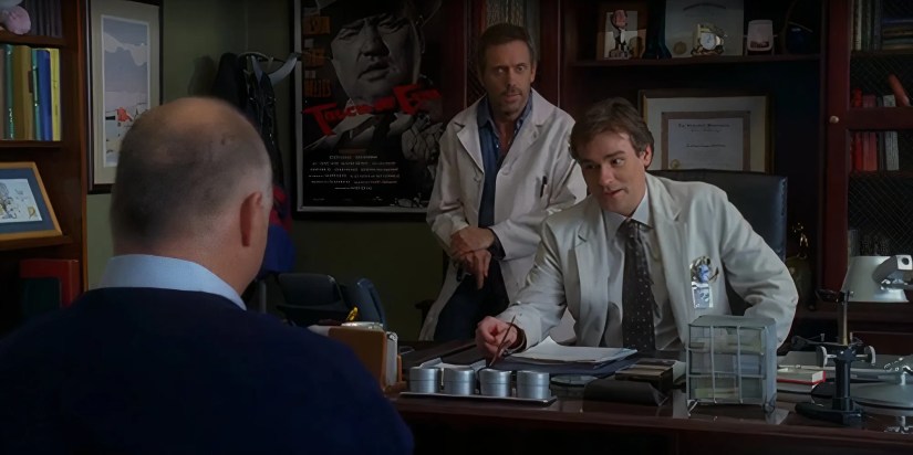 Hugh Laurie as Gregory House and Robert Sean Leonard as James Wilson talking to Wilson’s misdiagnosed patient in the House episode Games.