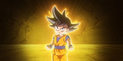 Goku glowing with energy in his mini form.