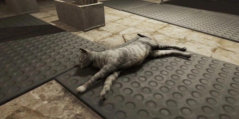 A cat stretching out on the floor in Fallout 4.