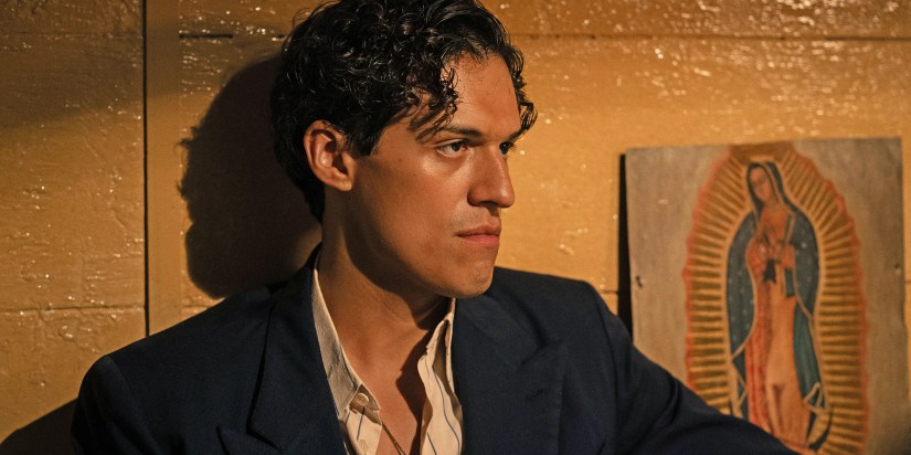 Omar Apollo looking to the side in Queer