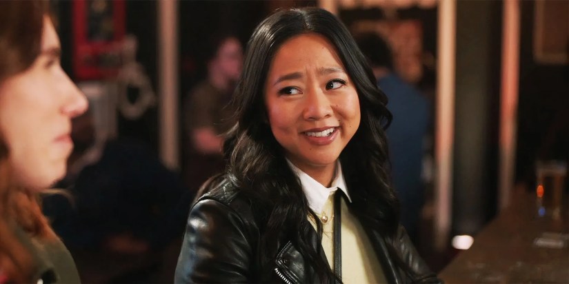 Stephanie Hsu smiling in a scene from Laid