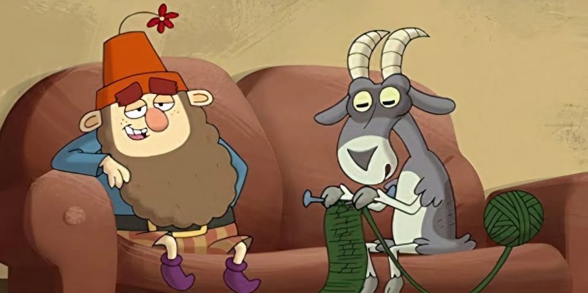 Grumpy from The 7D sits on a couch next to a goat knitting a green scarf.