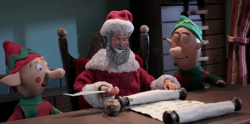 Santa and two elves working on a list in the Robot Chicken Lots Of Holidays Special.