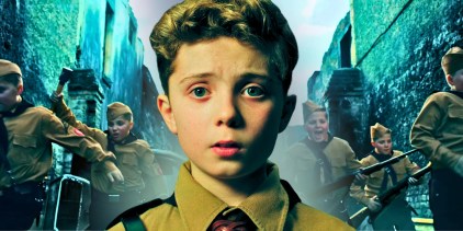 Roman Griffin Davis as Jojo in jojo rabbit and an army of kids in the background