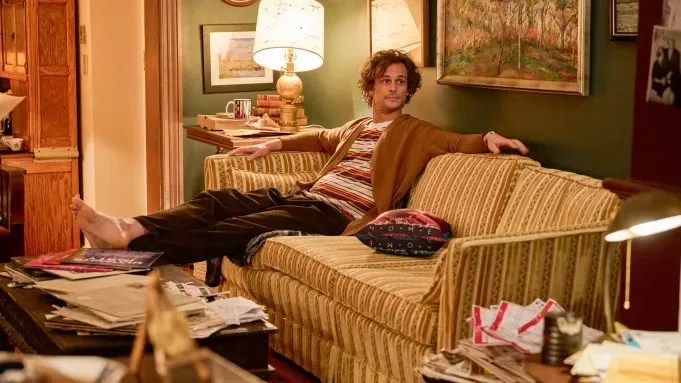 Lewis Einstein (Matthew Gray Gubler) relaxing on a couch in Einstein