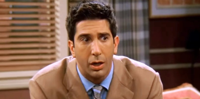 Ross looking shocked as Rachel tells him she’s pregnant in Friends.