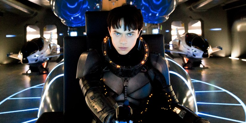 Dane DeHaan as Valerian flying a ship in Valerian and the City of a Thousand Planets.