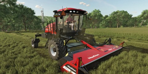 Farming Simulator 25 tractor mowing a field