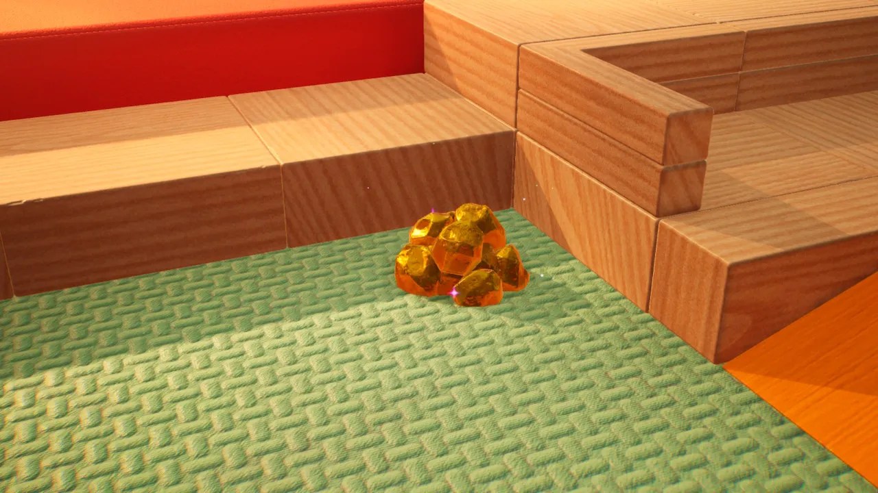 A pile of gold nuggets in a corner in Dream Home on sublevel one.