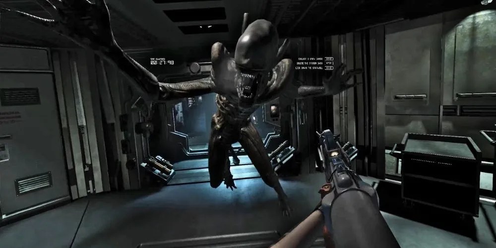 A first-person view of Amanda Ripley aiming a flamethrower at the Xenomorph in Alien: Isolation.