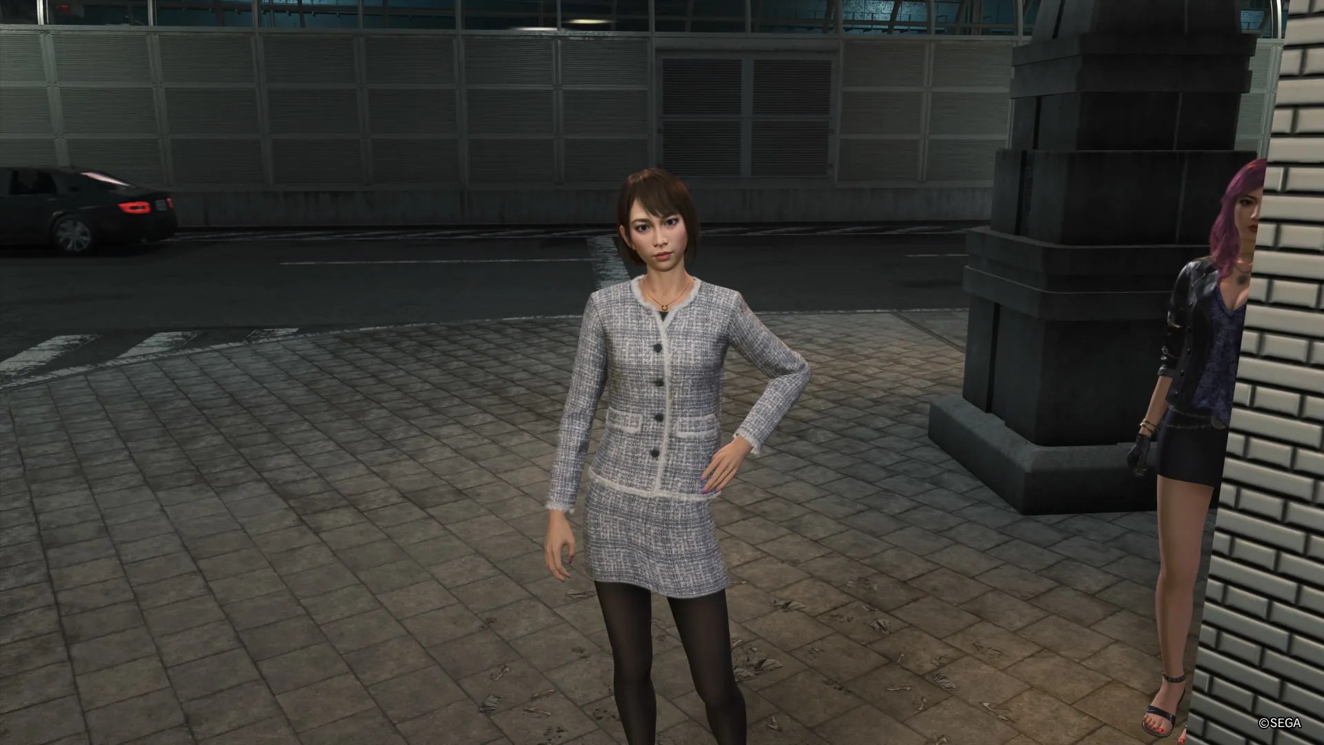 Like A Dragon Infinite Wealth, Saeko posing while Seonhee looks on from the shadows