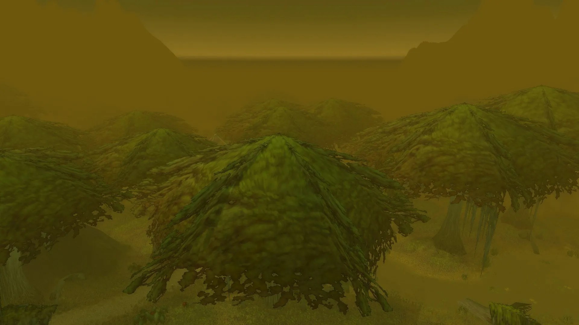 A vista in the Swamp of Sorrows, looking east over it, its muddy-green trees obscuring the bog below