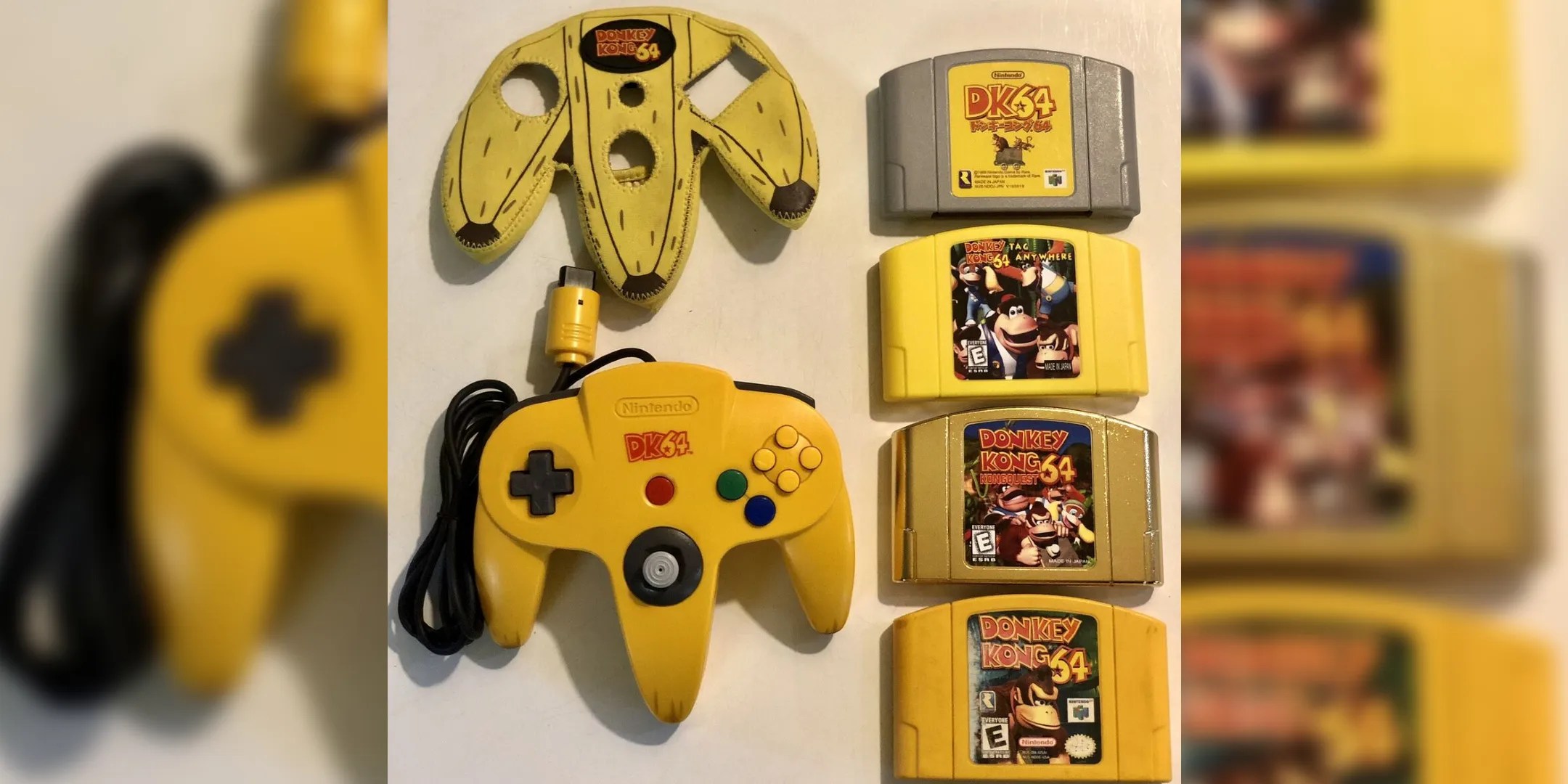 A Doneky Kong GameCube controller with the cover and some games.