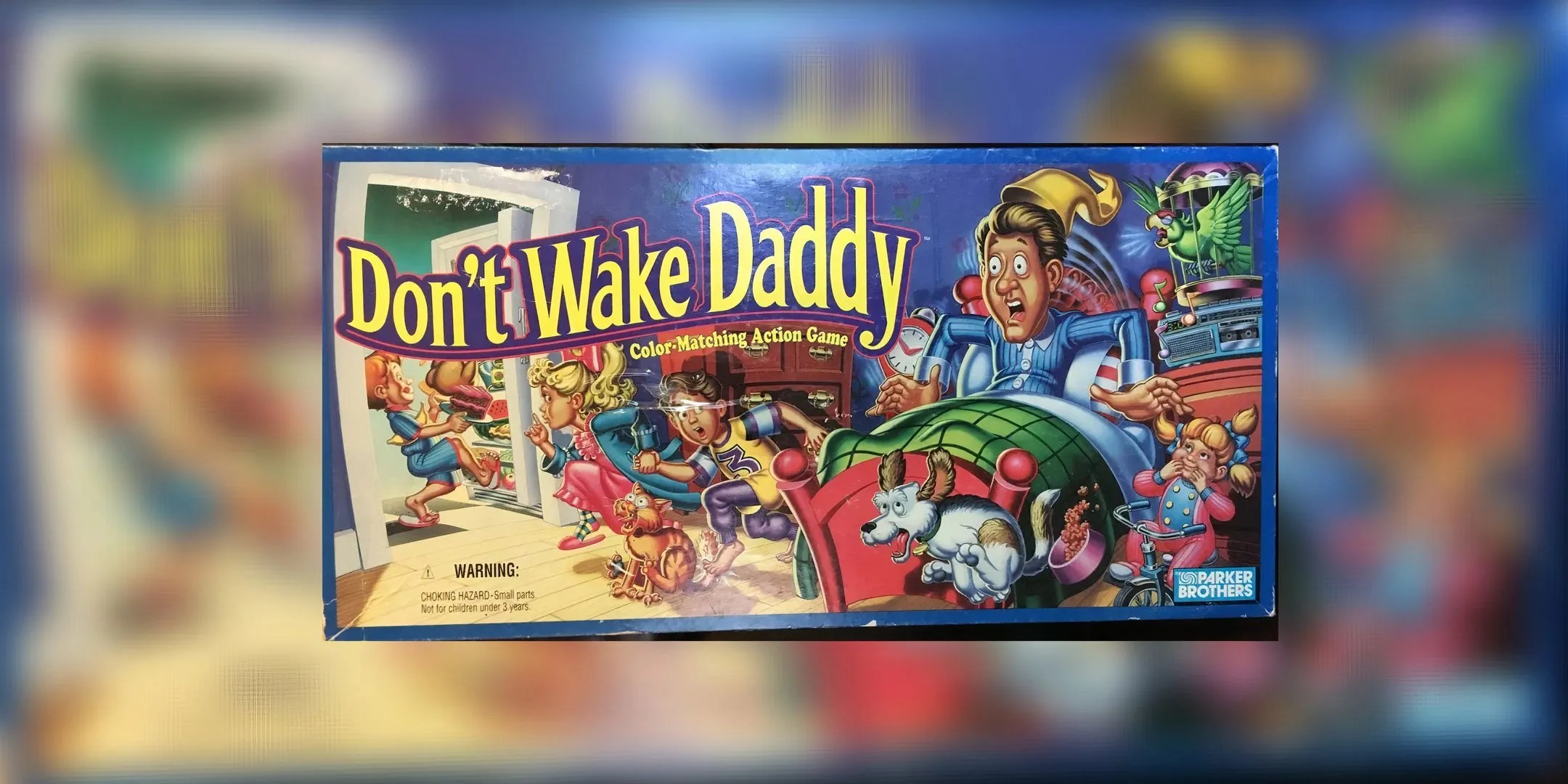 The dad of Don&rsquo;t Wake Daddy is woken up by the kids trying to sneak into the kitchen on the box cover.