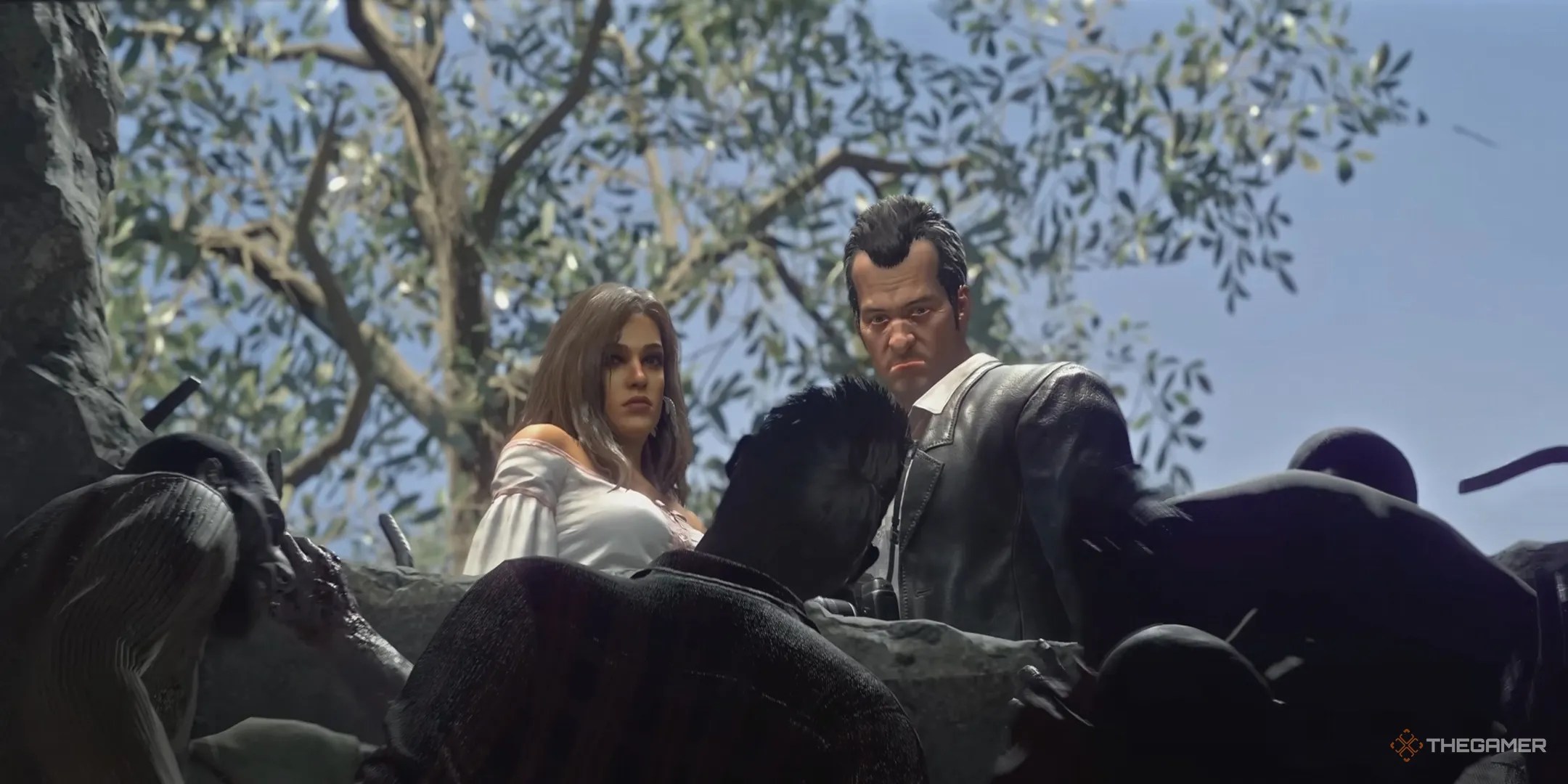 Frank and Isabella stare at the zombie pit beneath the clock tower.