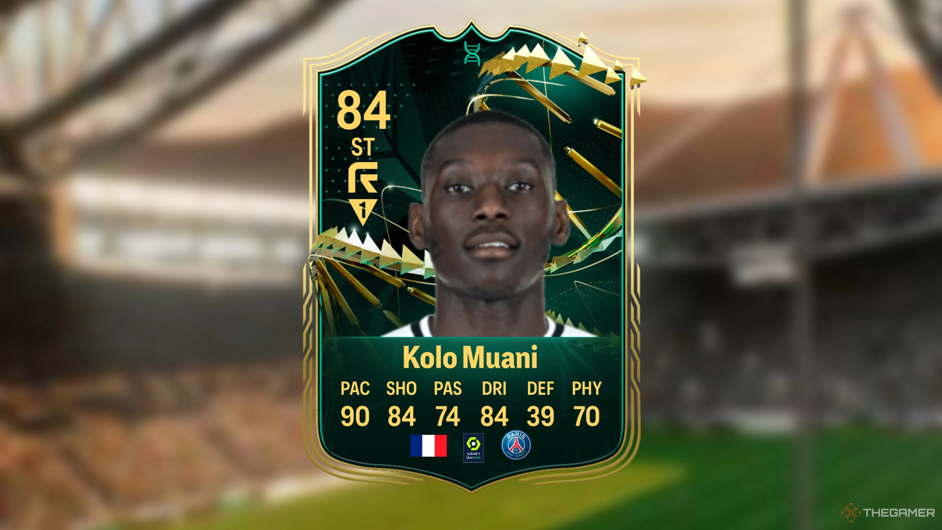 Image showing Kolo Muani card against a faded stadium background.