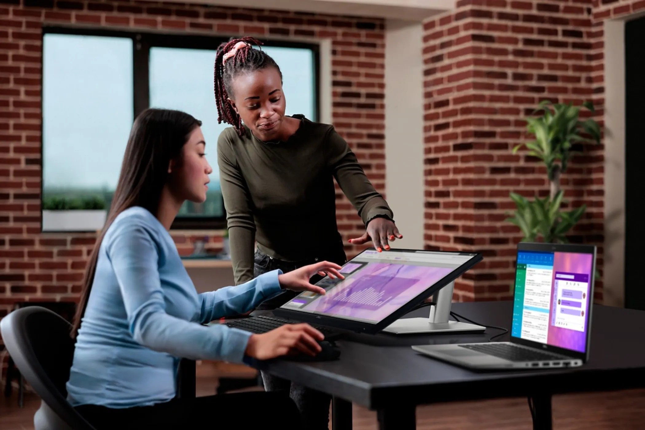 Dell's new monitor can come down to your desk and supports touch