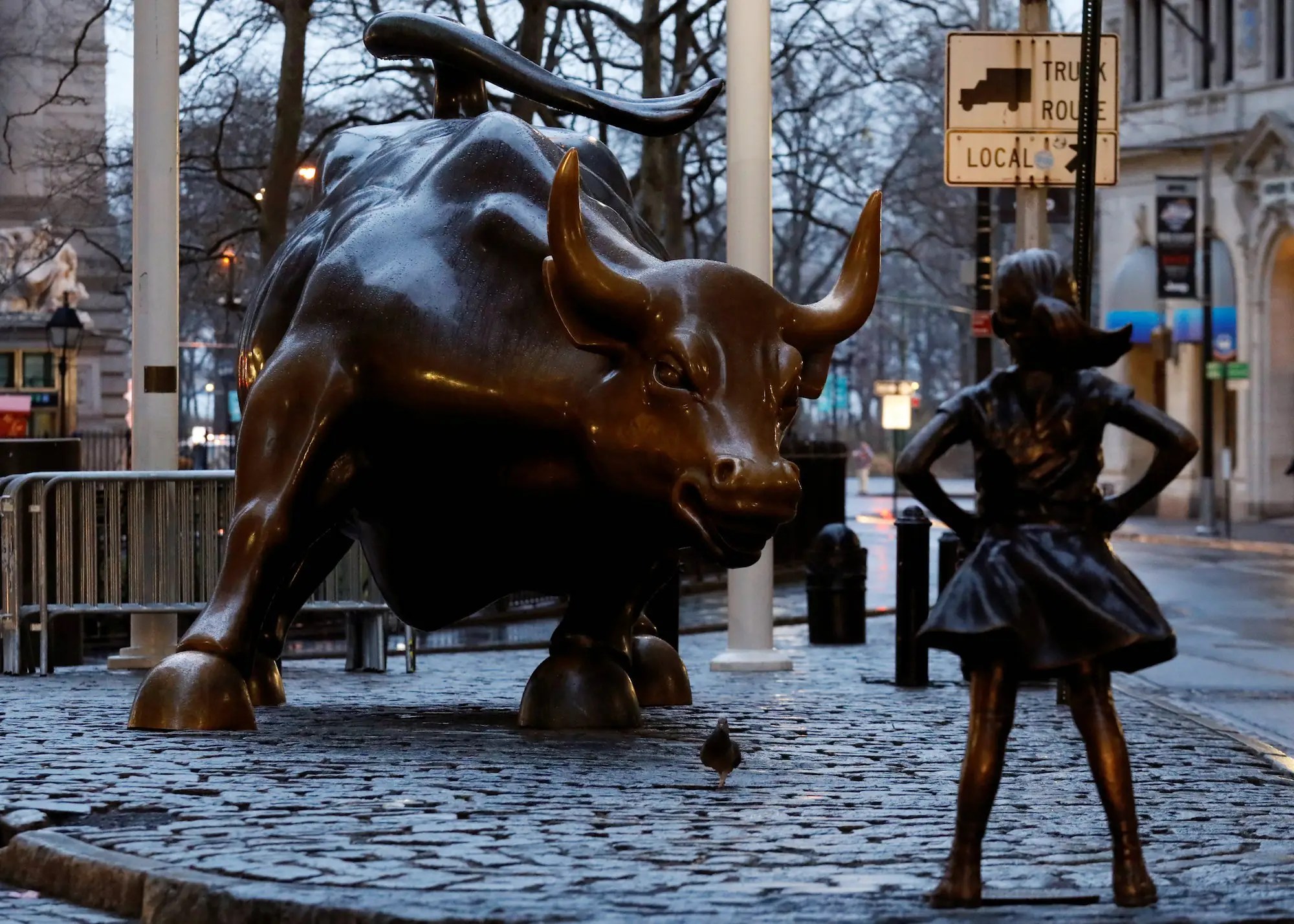 State Street Global Advisors' girl statue in front of Wall Street bull