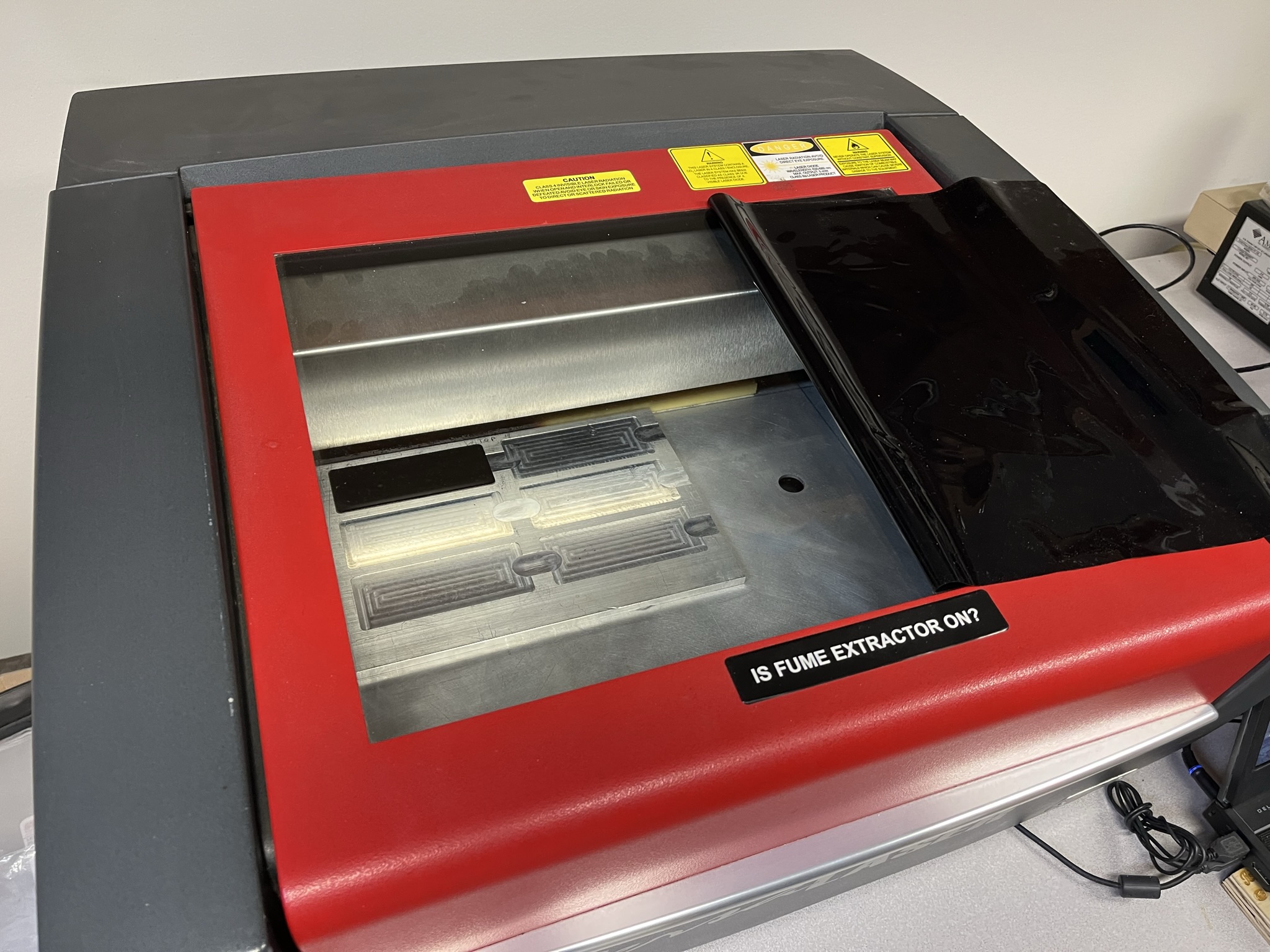 Engraving System by VersaLaser | Staub Precision Machinery