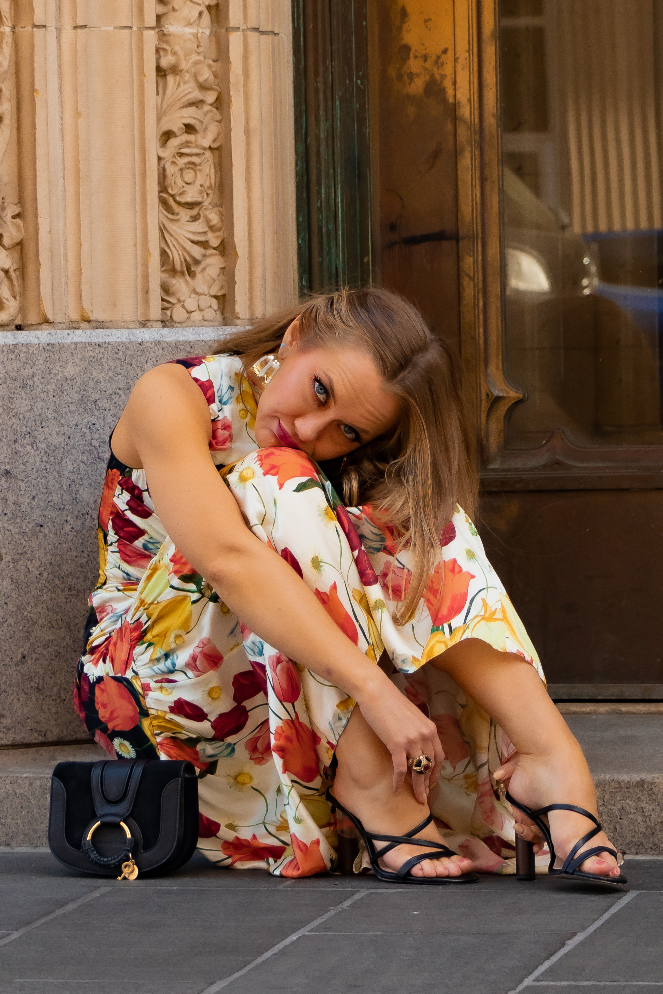 Sustainable luxury with Stig: Mother of Pearl Brand Spotlight | Silk ruched midi dress with tulip print, strappy heels, see by chloe hana bag for a night look or a wedding guest outfit