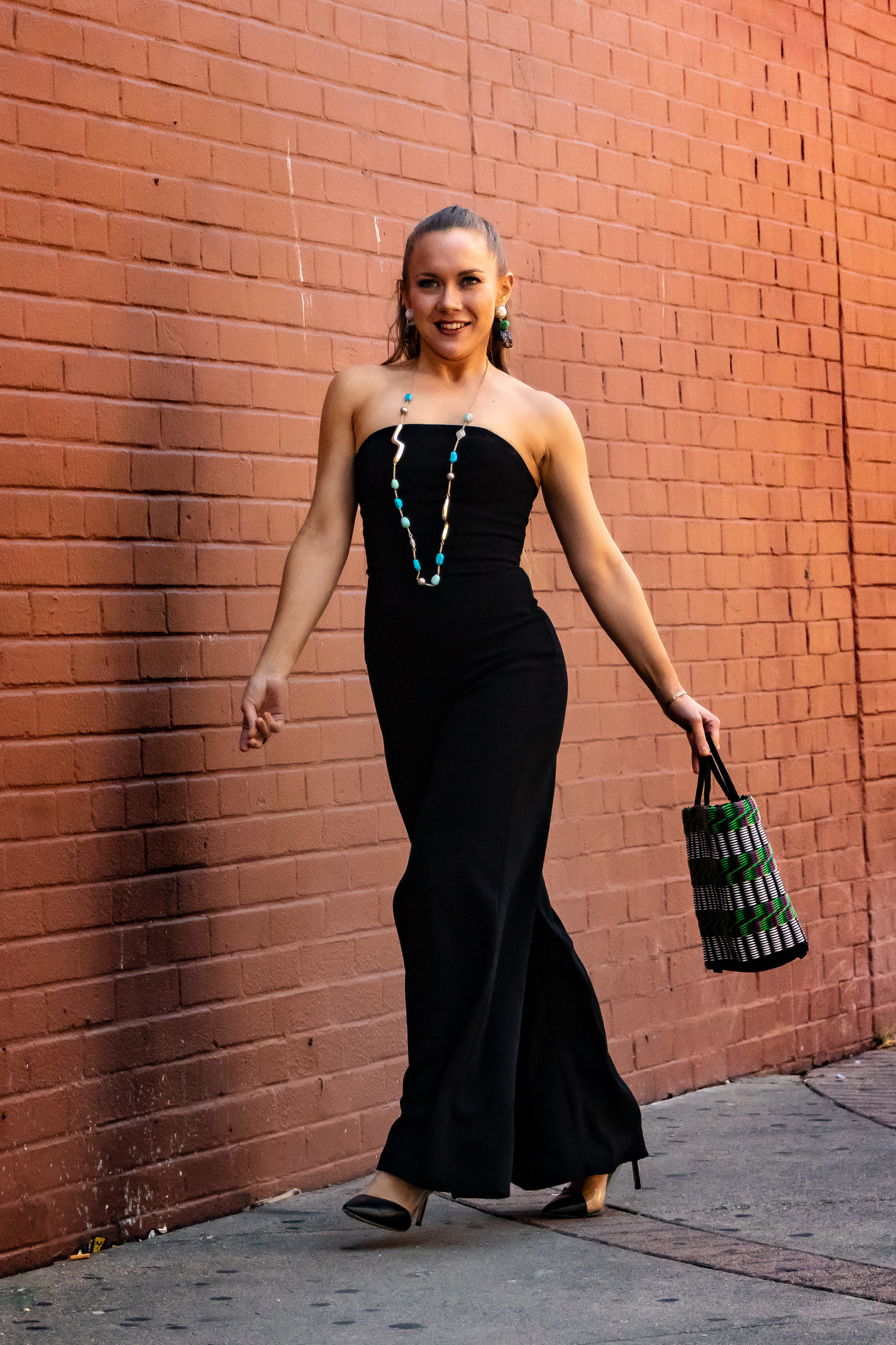 OOTD with black jumpsuit from Amanda Uprichard, Alexis Bittar and Lele Sadoughi jewelry, Truss bag, and clear pumps from Nine West for an office or cocktail look!