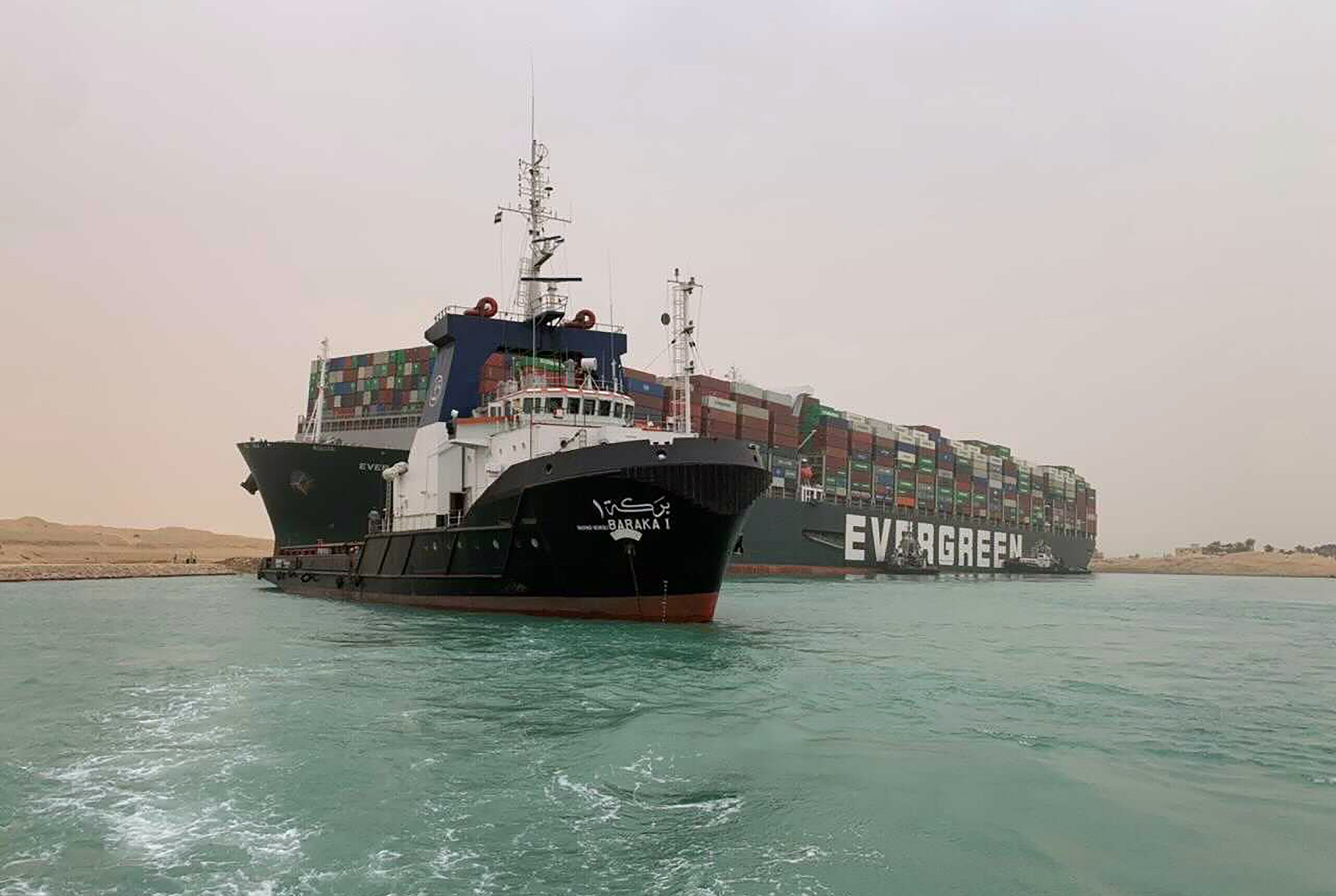 Massive cargo ship wedged, blocks Egypt's Suez Canal AP News