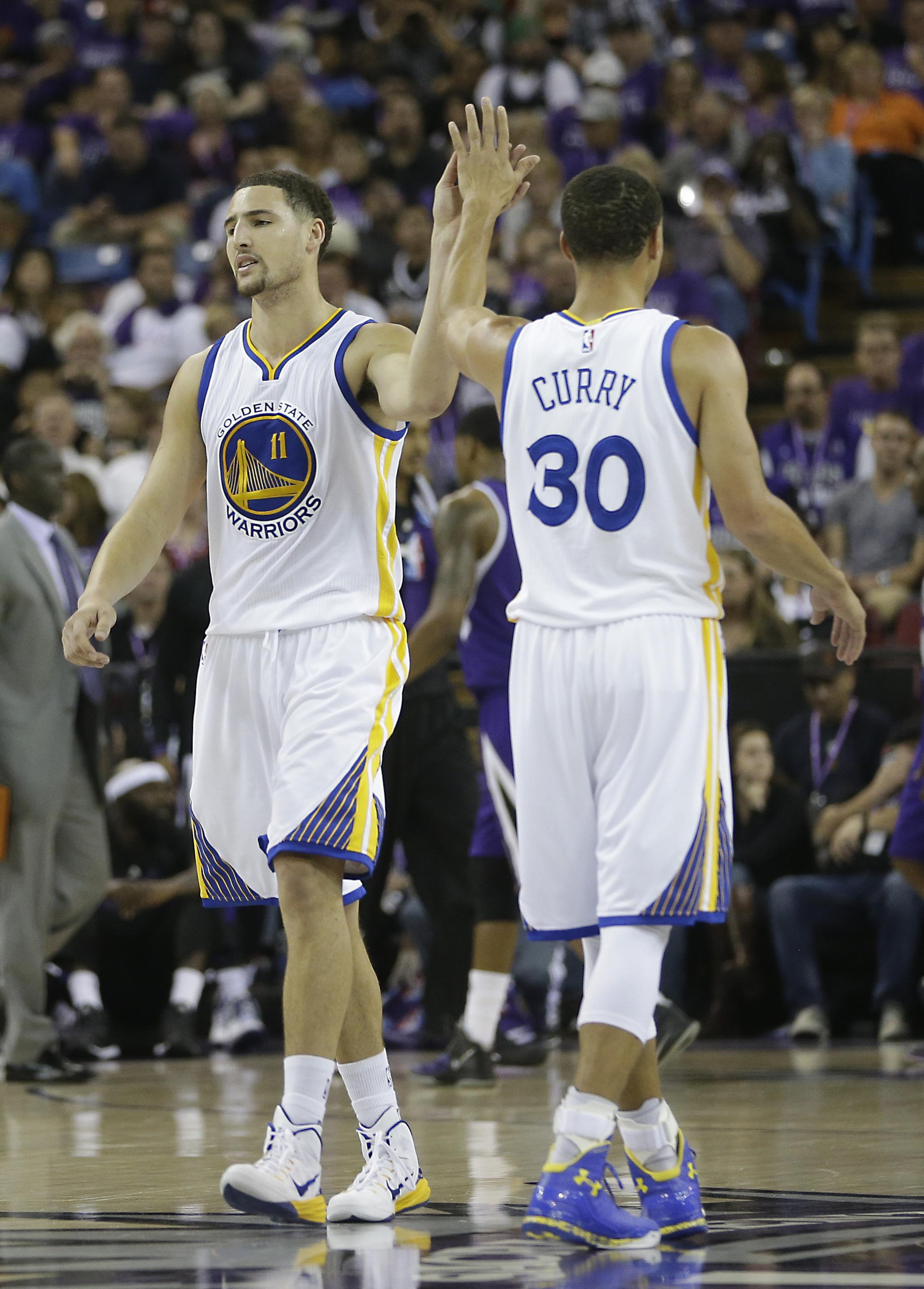 Curry y Thompson, la dupla ganadora de los Warriors AP News