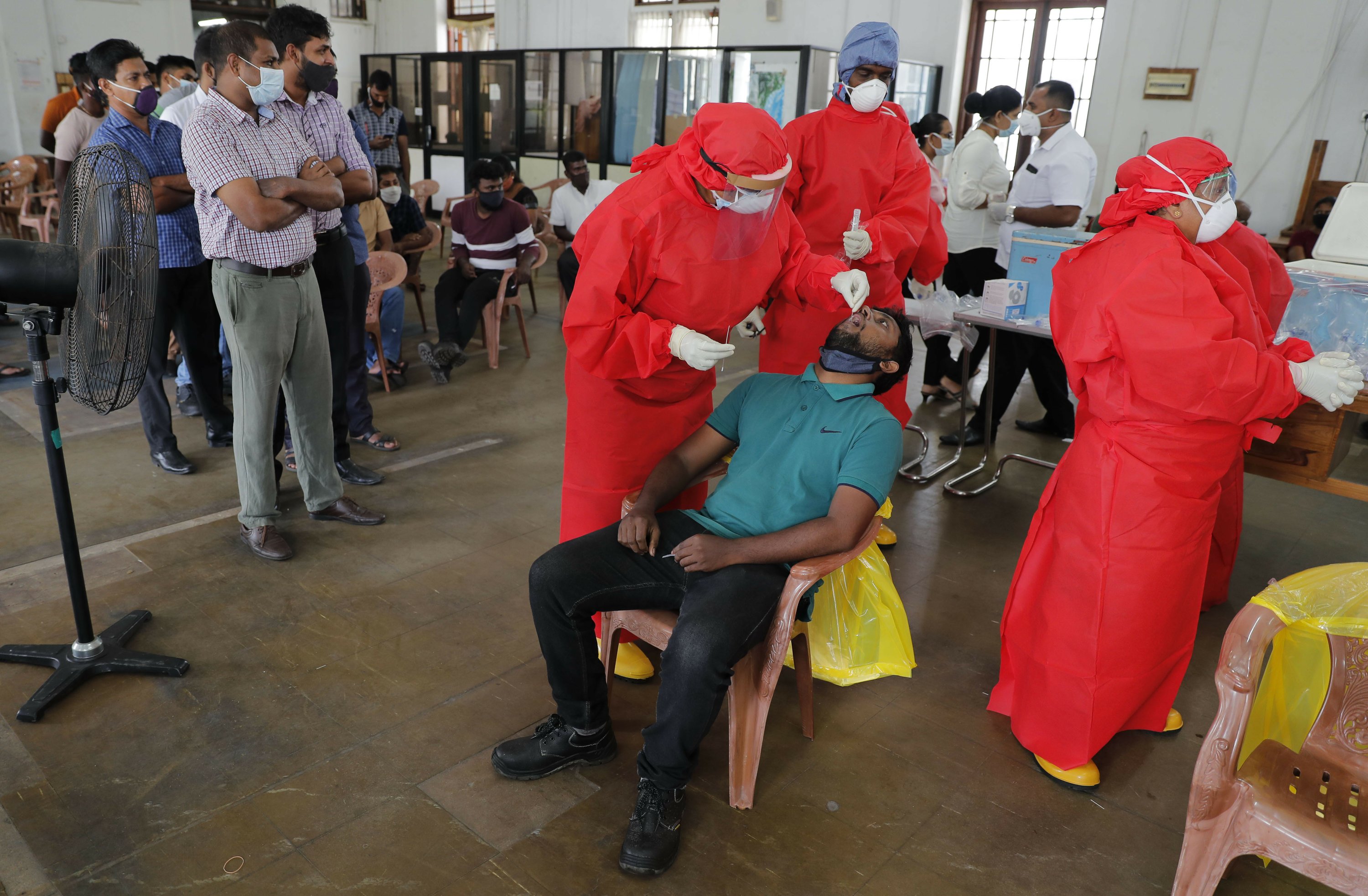 Sri Lanka closes key gov't offices as virus outbreak surges AP News