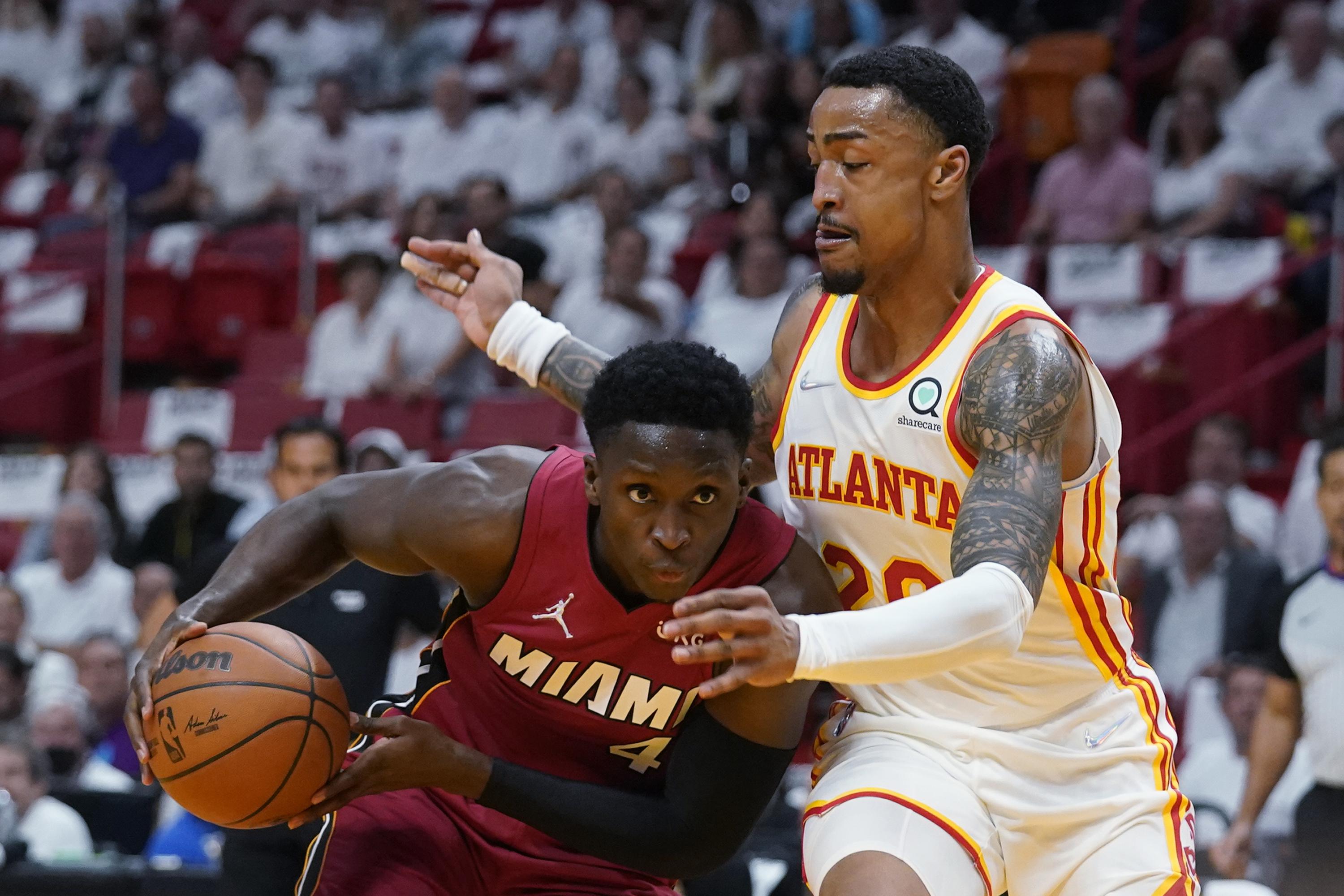 Heat hold off Hawks 9794, reach Eastern semifinals AP News