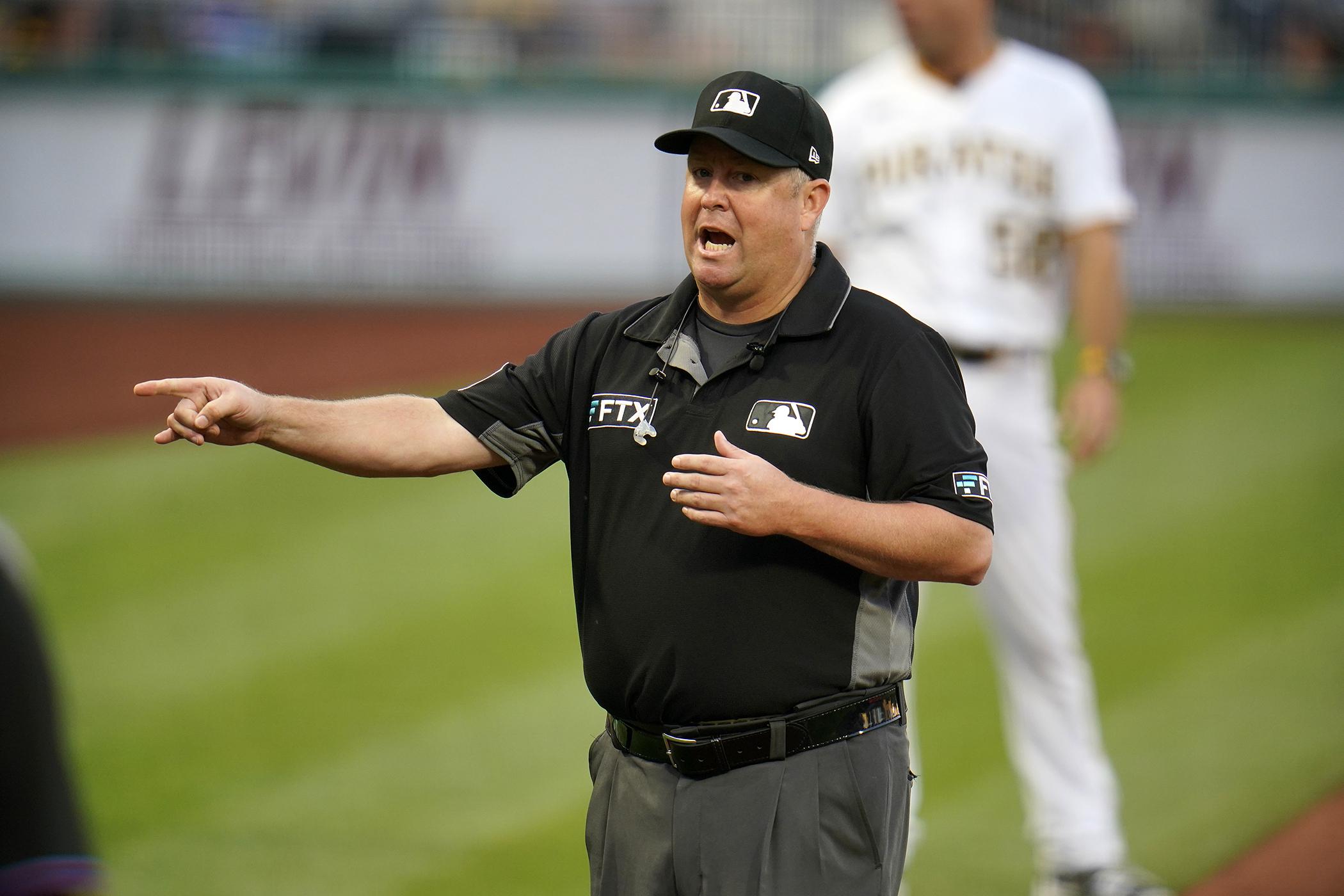 Beyond the grunt Umpires mic up, and baseball changes a bit AP News