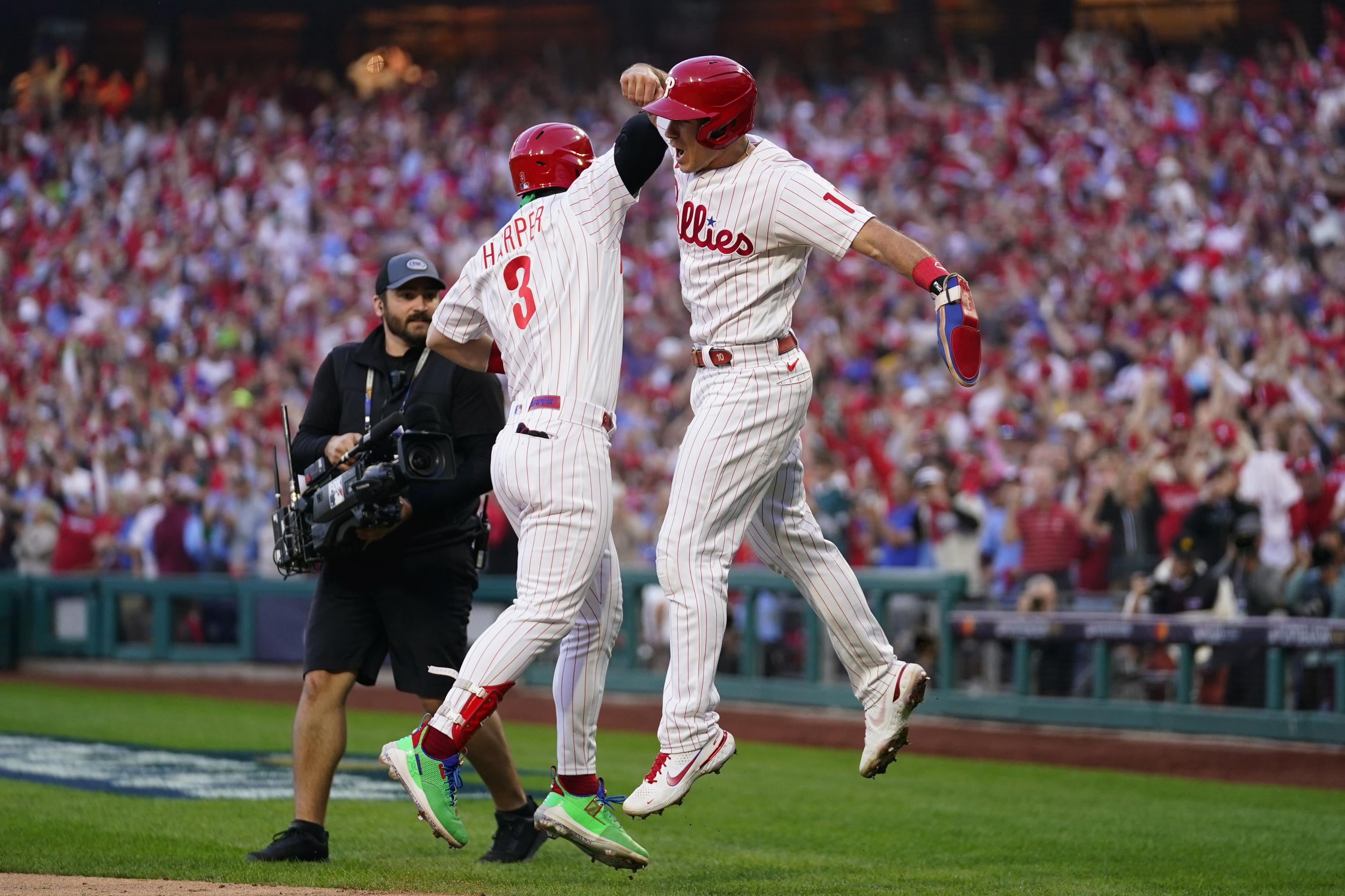Spike This! Hoskins, Harper homer, Phils rout Braves in NLDS AP News