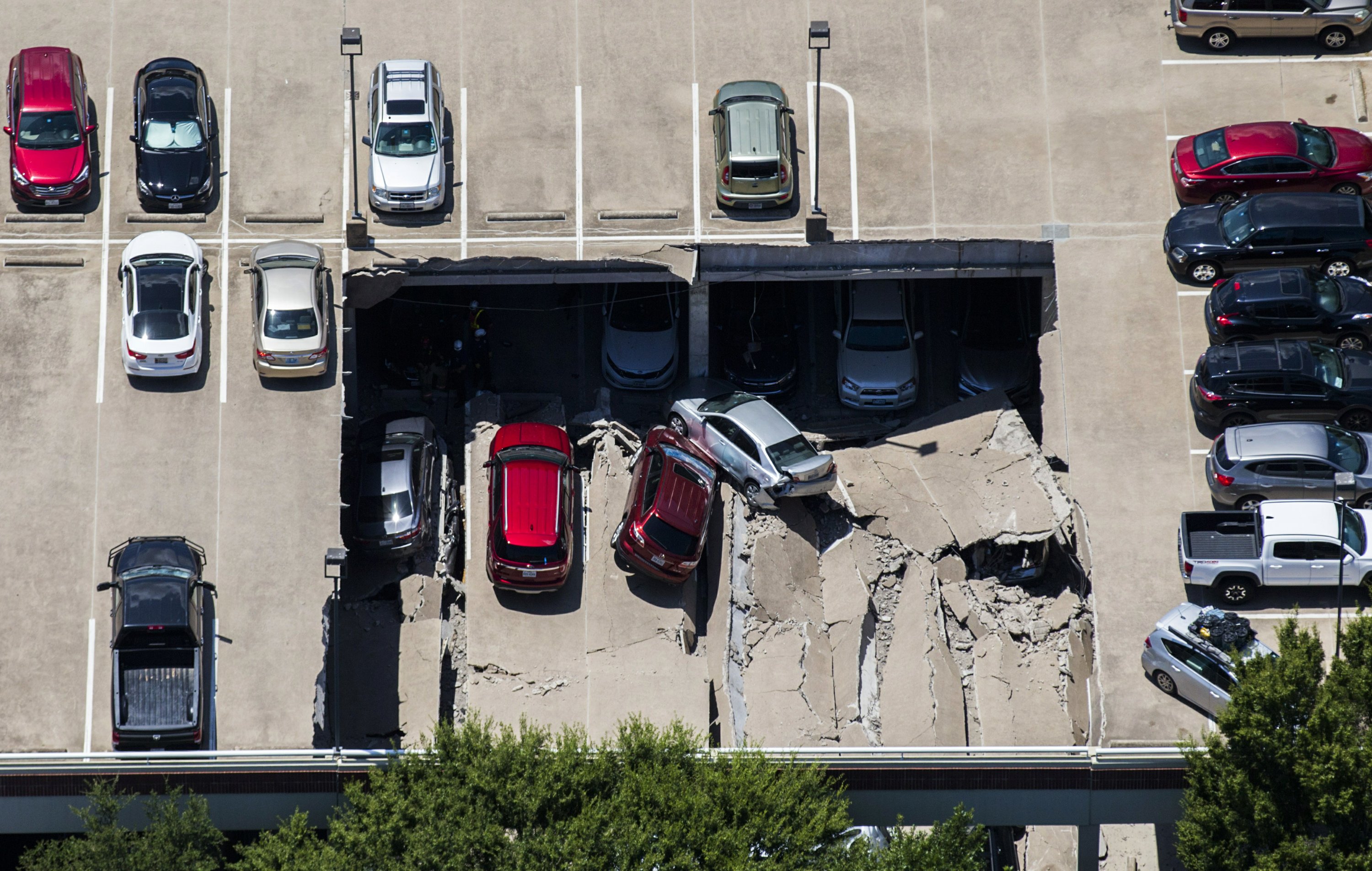 Parts of Texas parking garage collapse; no apparent injuries AP News