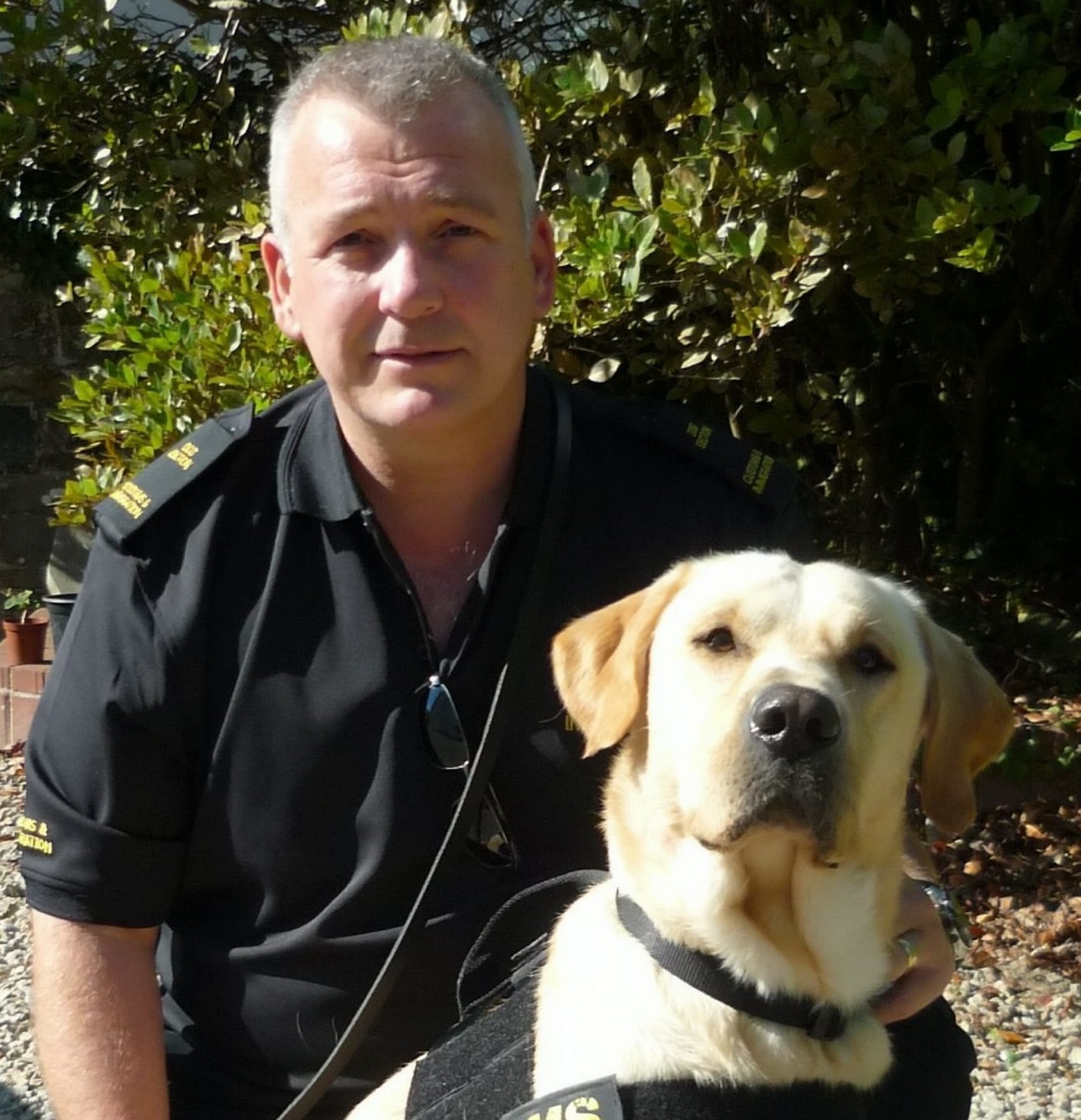 Trainee dog handler has won a pay out after he lost his job because