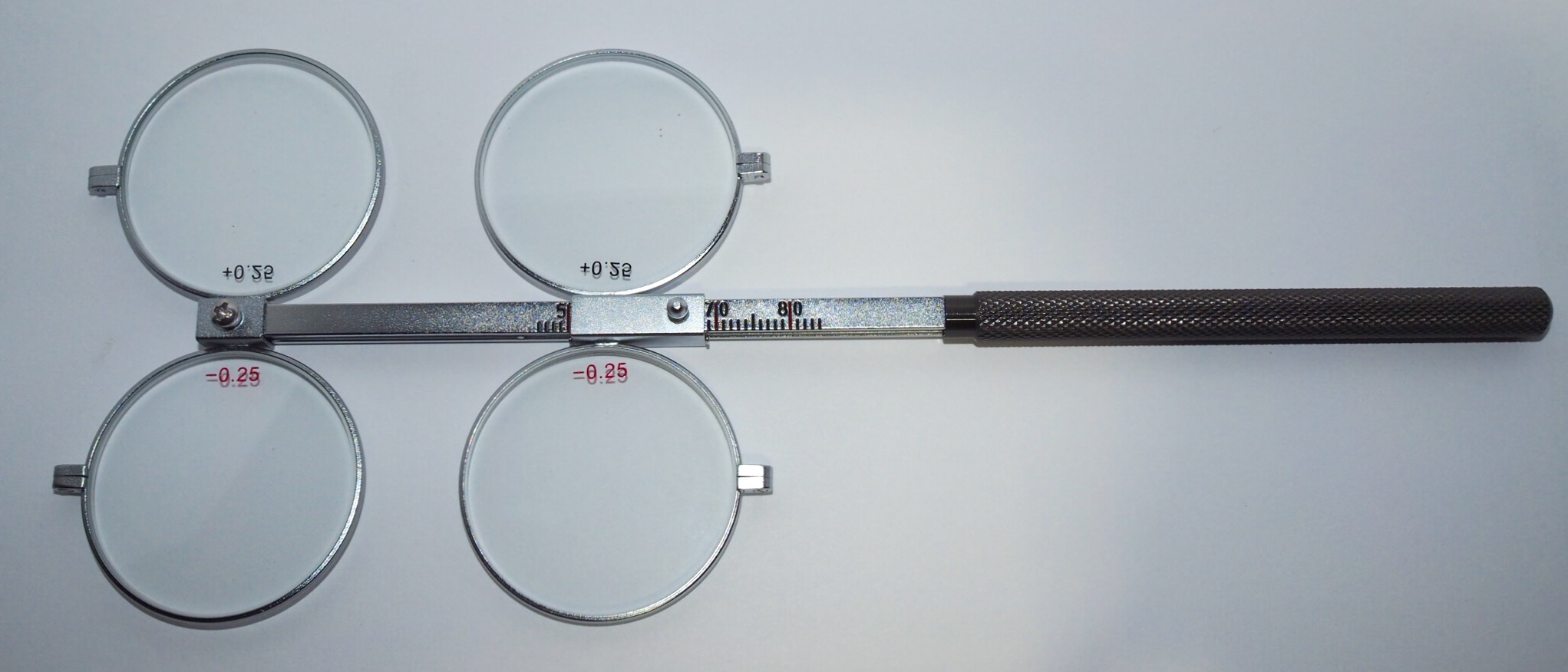 Metal Lens Flippers +/ 0.25D « StrongVisionTech