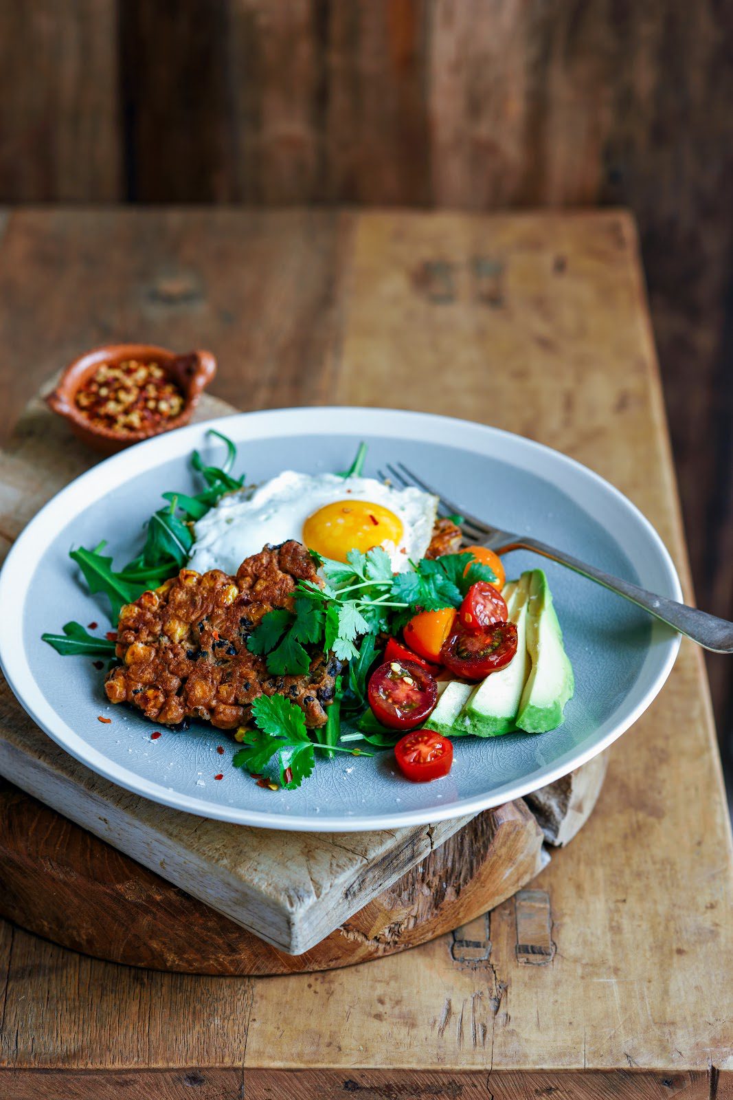 black bean, corn & chickpea fritters with lime tomato salsa, avocado