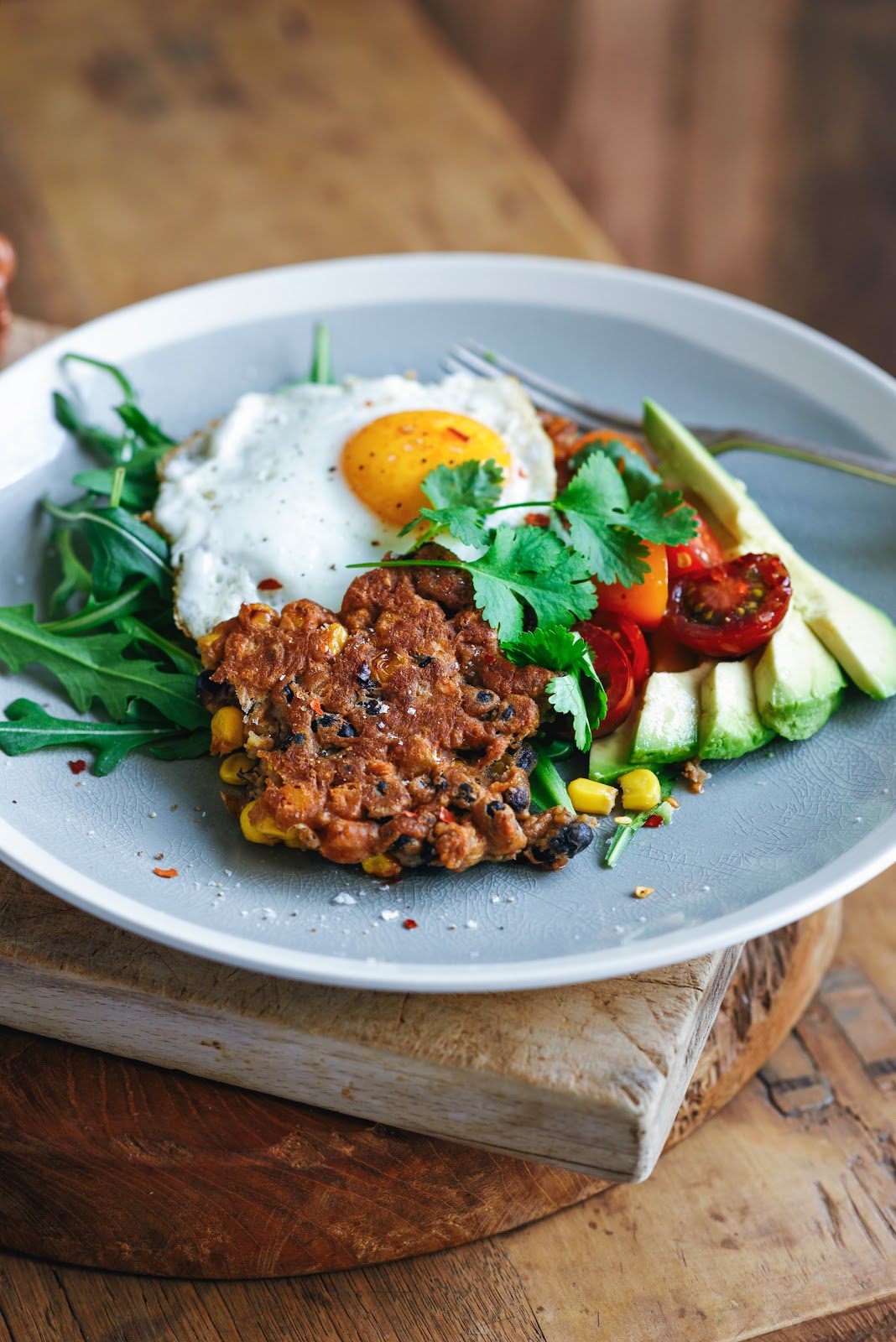 black bean, corn & chickpea fritters with lime tomato salsa, avocado