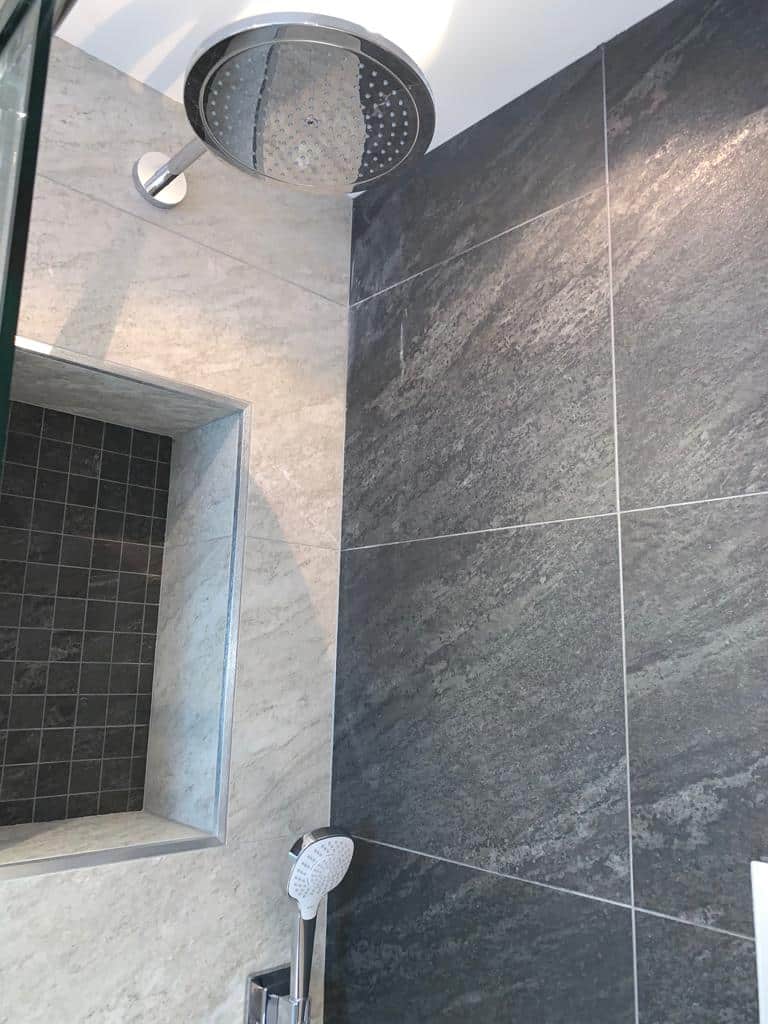 Bathroom and Walk in Shower with Sloped Ceilings Studio One South