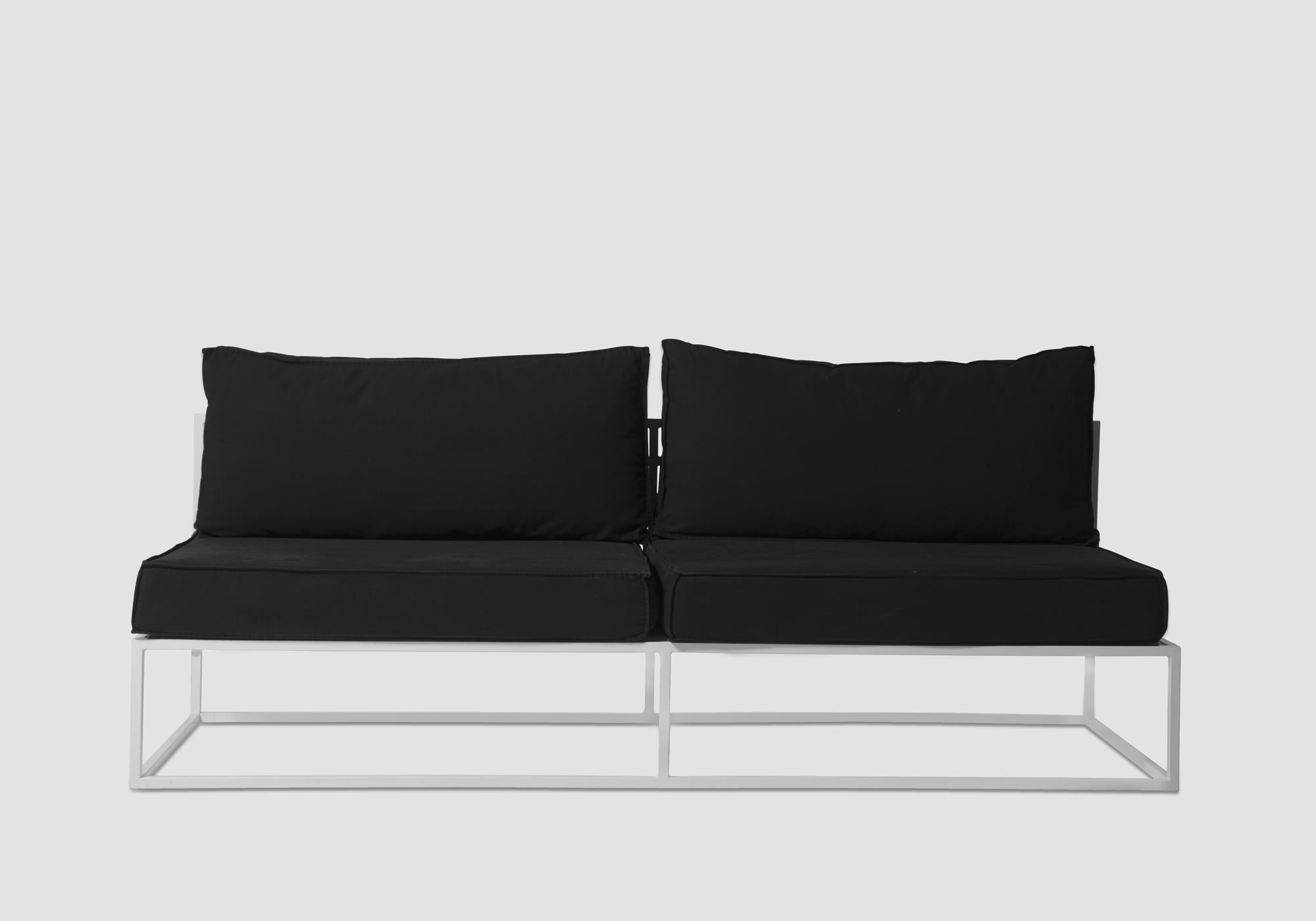 Soho Sofa with black pillows