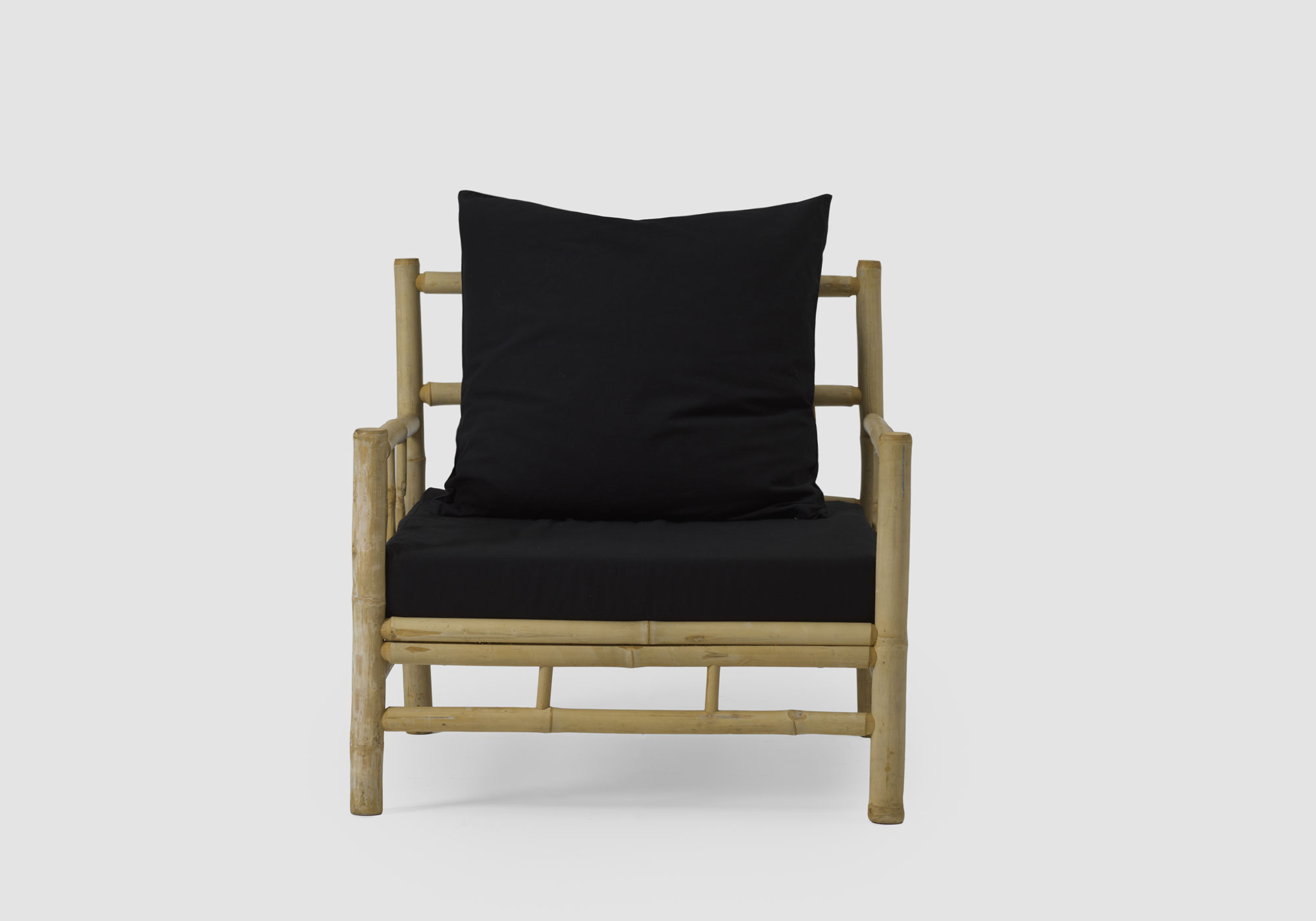 Bamboo Lounge chair with black pillows