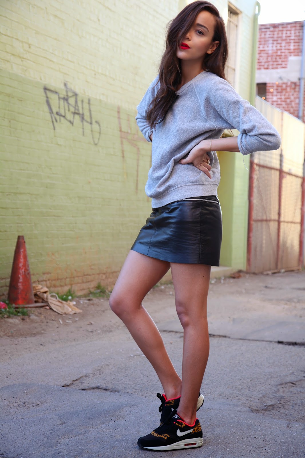 30 Outfits That’ll Make You Want a Black Leather Skirt StyleCaster