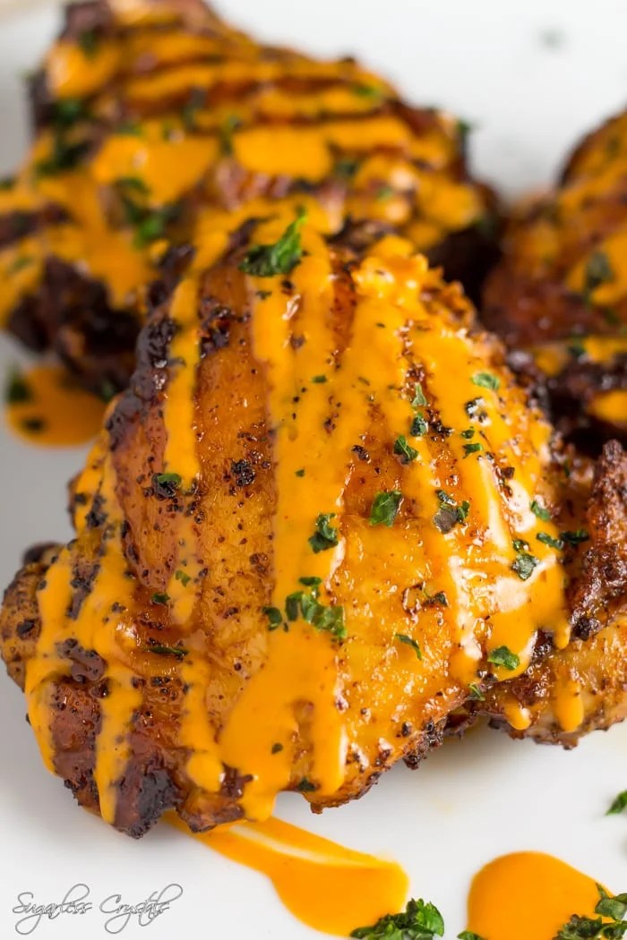 Spice Rubbed Buffalo Chicken Thighs Drizzled In Sauce